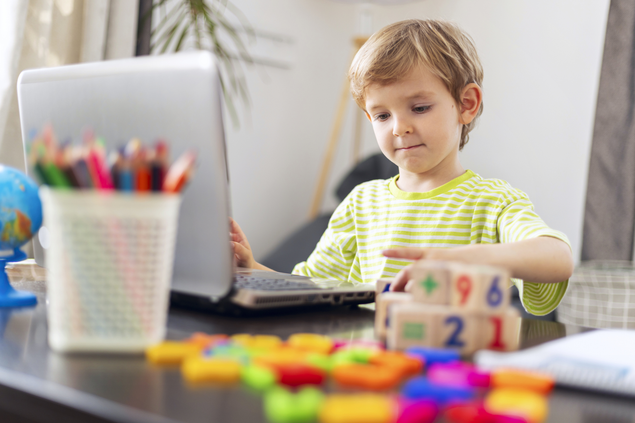 Child participating in virtual autism evaluation session